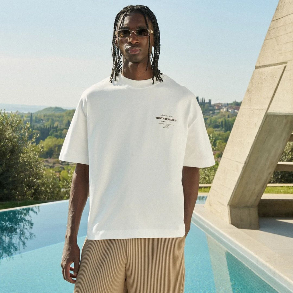 The Couture Club Beach Club Graphic T-shirt Off White/Bruin
