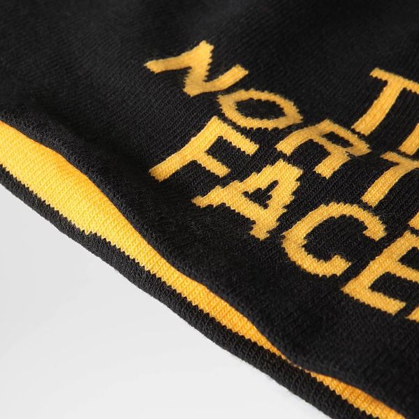 The North Face Reversible TNF Banner Muts Zwart/Geel